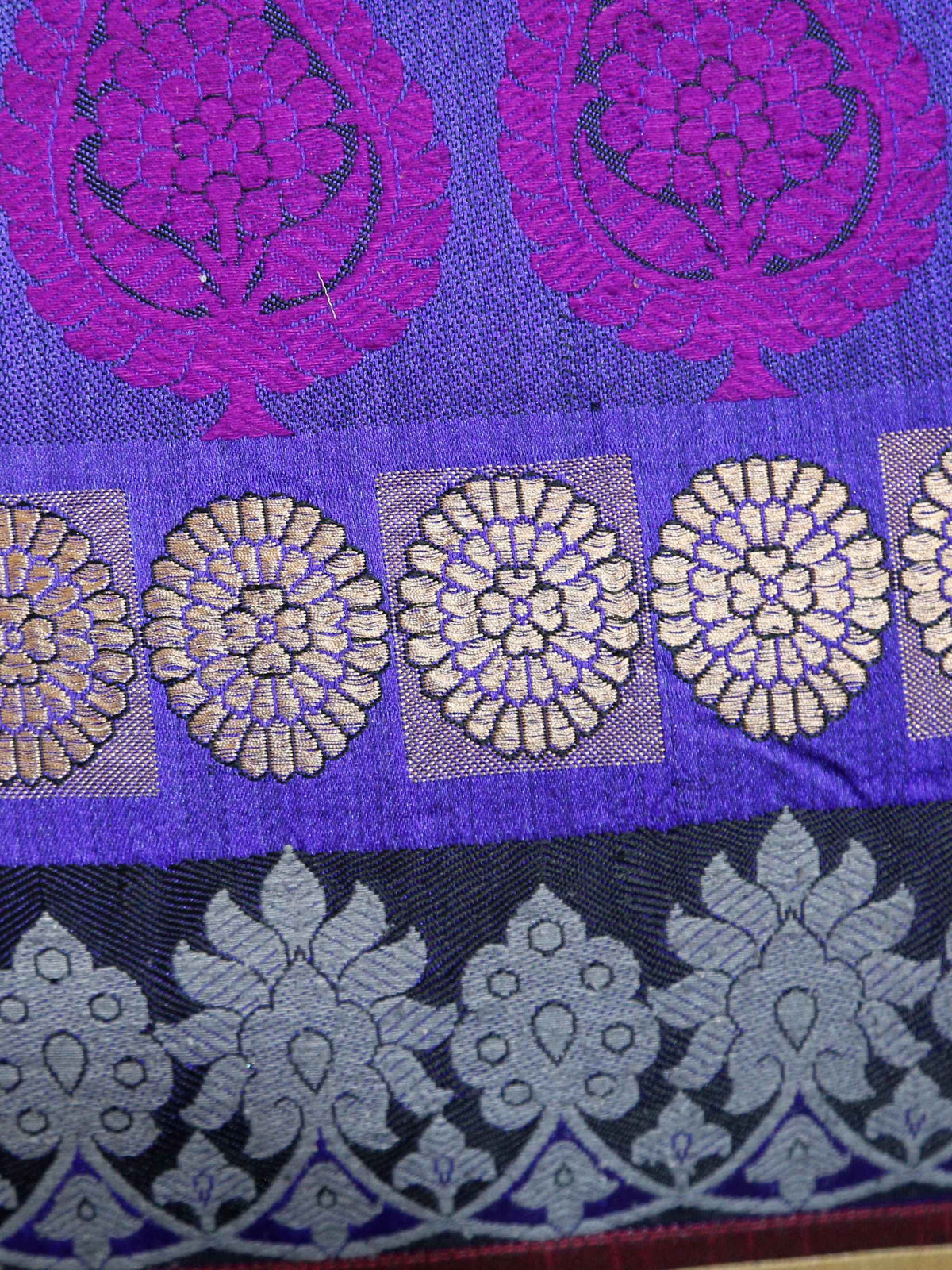Close up of the purple, magenta and gold banarasi brocade band