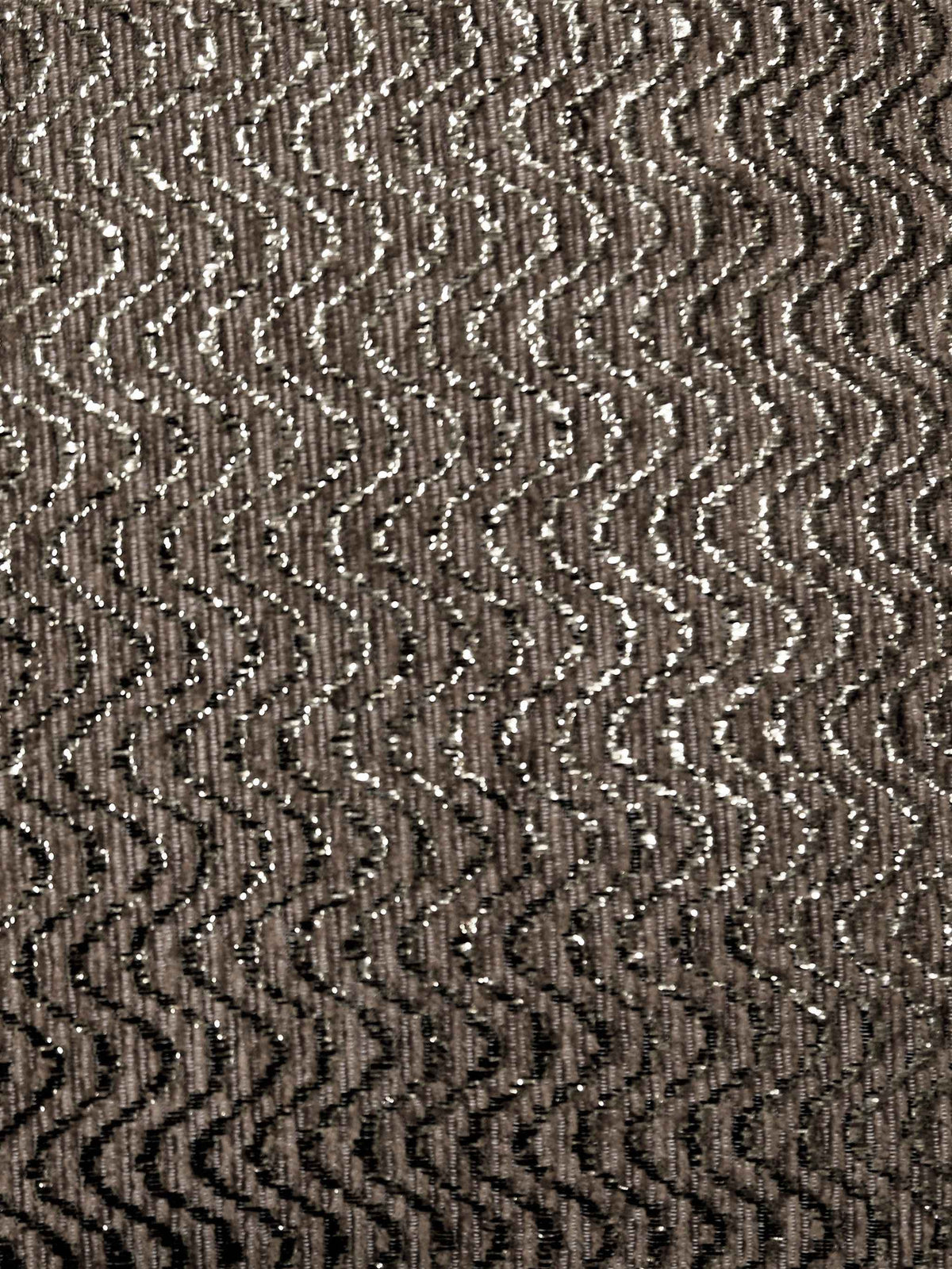 Close-up of the metallic wavy chevron weave
