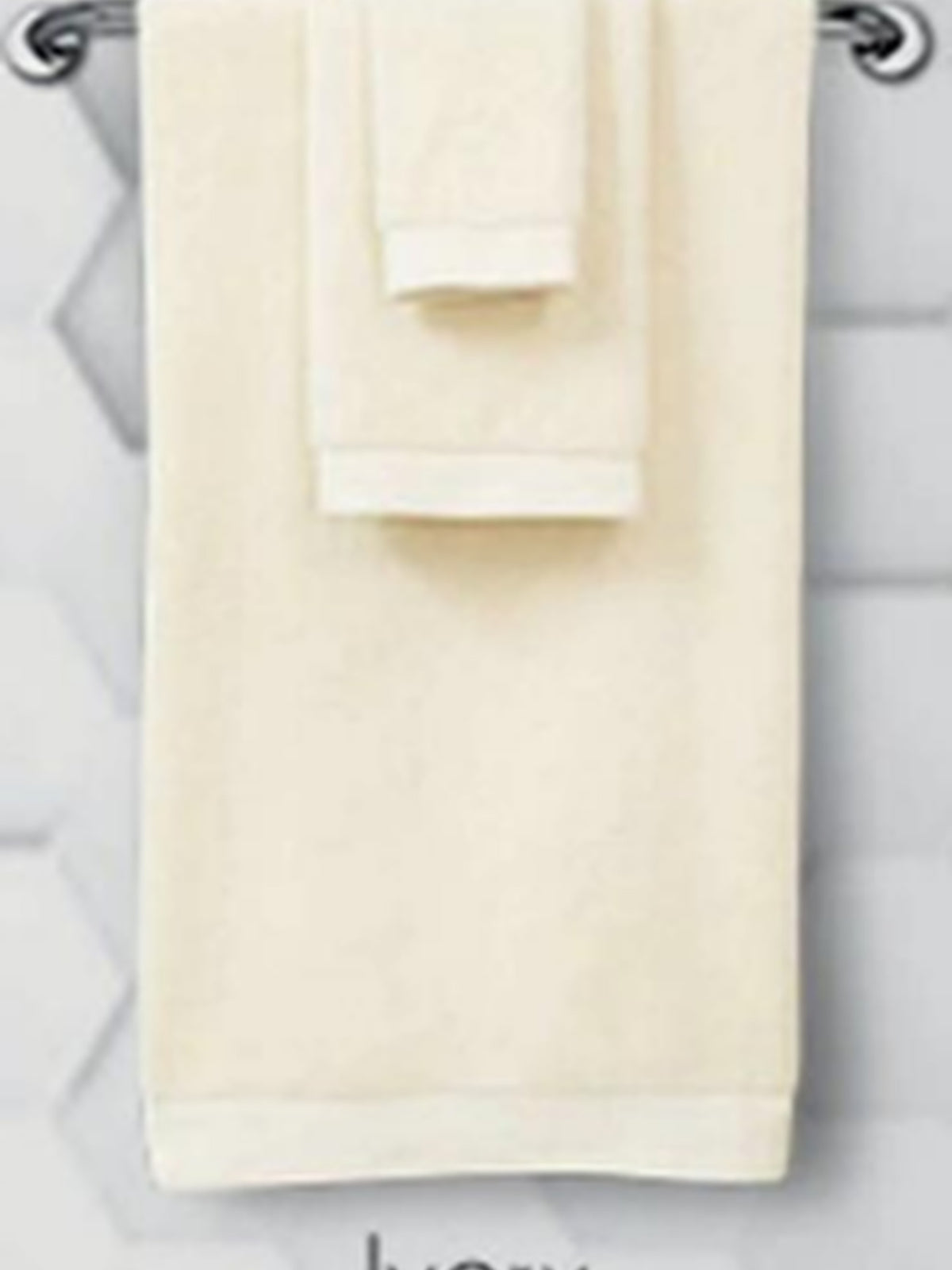 Ivory cotton towel set hanging on a rail, Resort Towel in Ivory