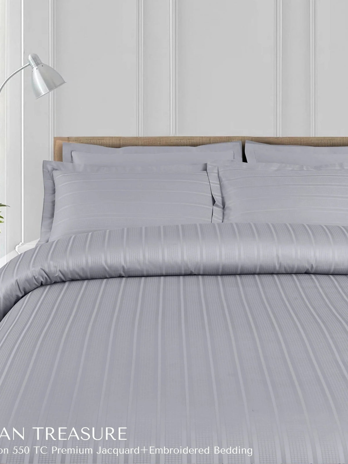Pale grey satin-stripe jacquard bedding made up on a bed, Tuscan Treasure 550TC