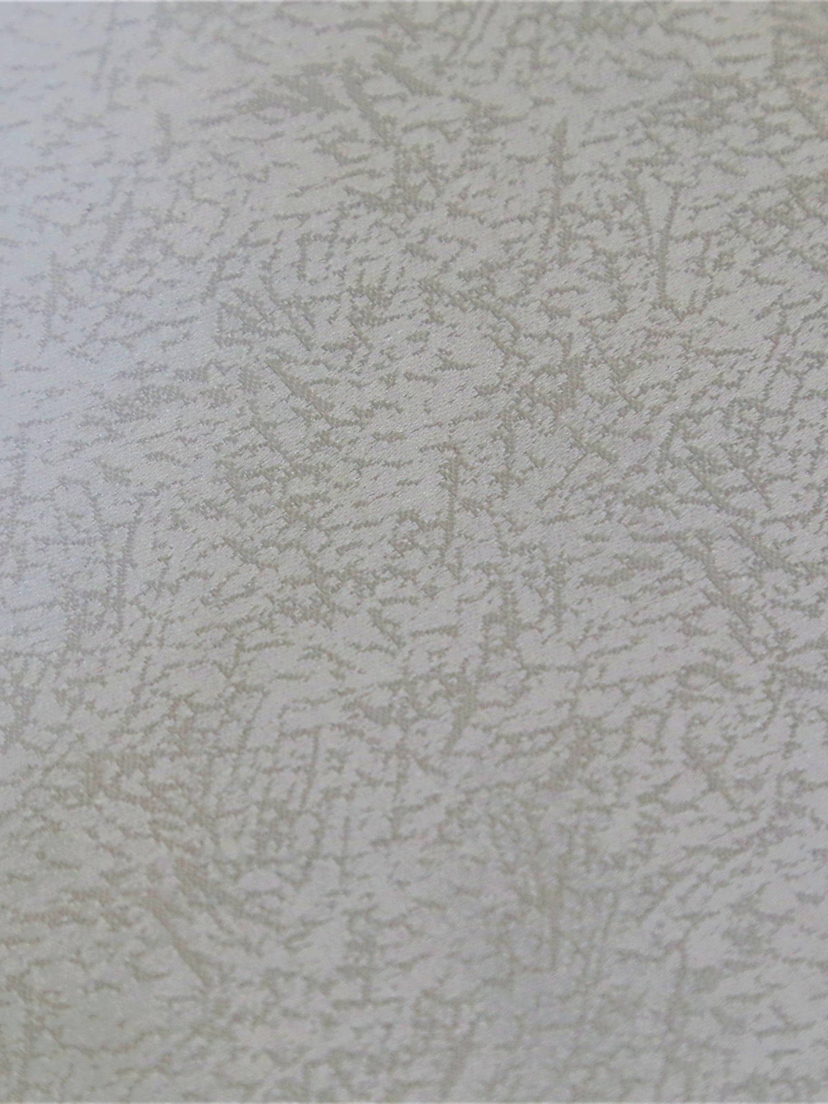 White oval table cover with a printed navy, purple, and green floral border pattern