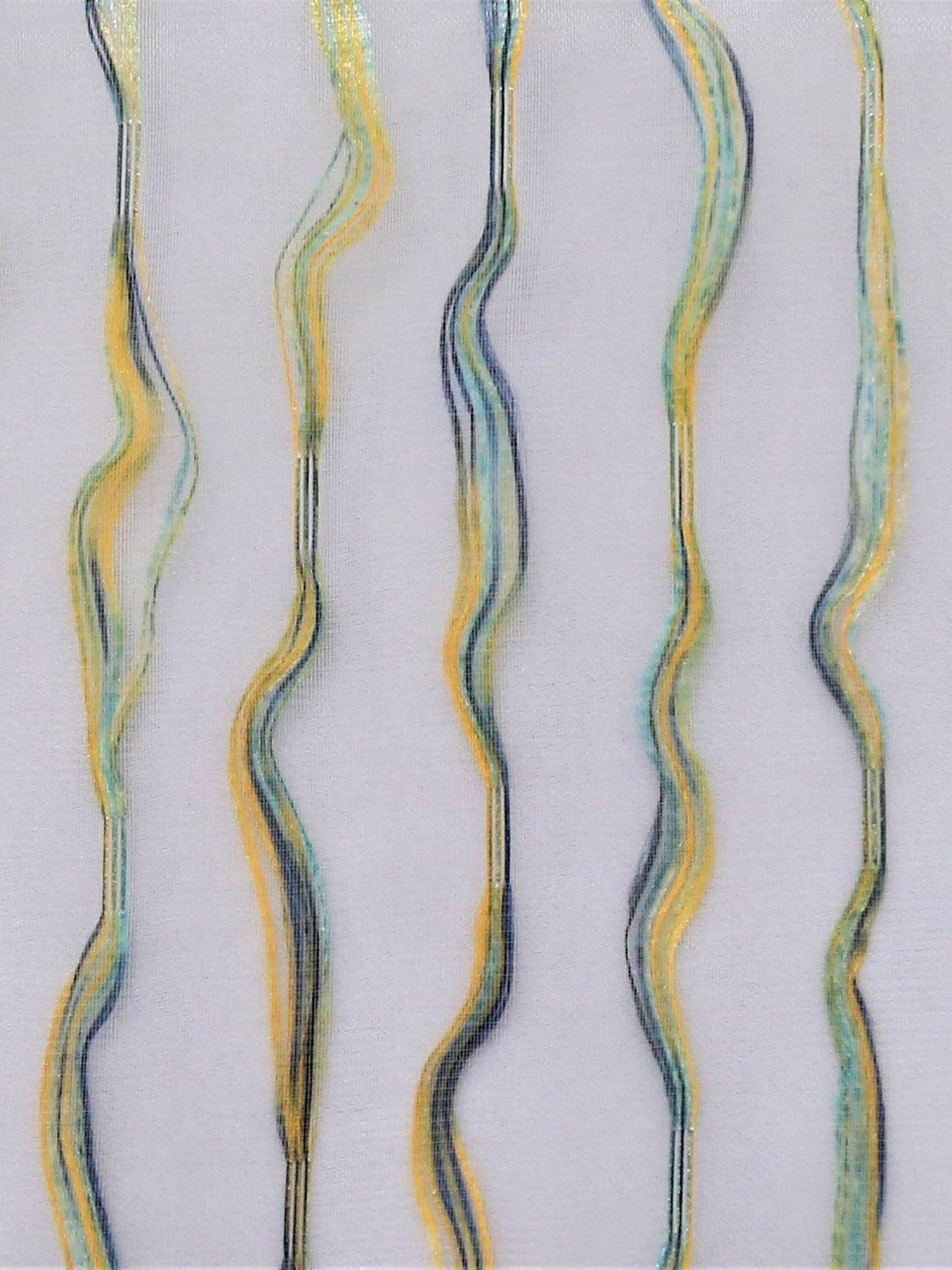 Cream table cover with a wavy multicolour stitch-line pattern and a solid sky-blue satin border