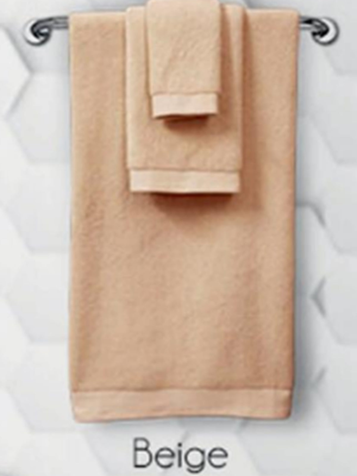 Beige cotton towel set hanging on a rail, face towel in Beige