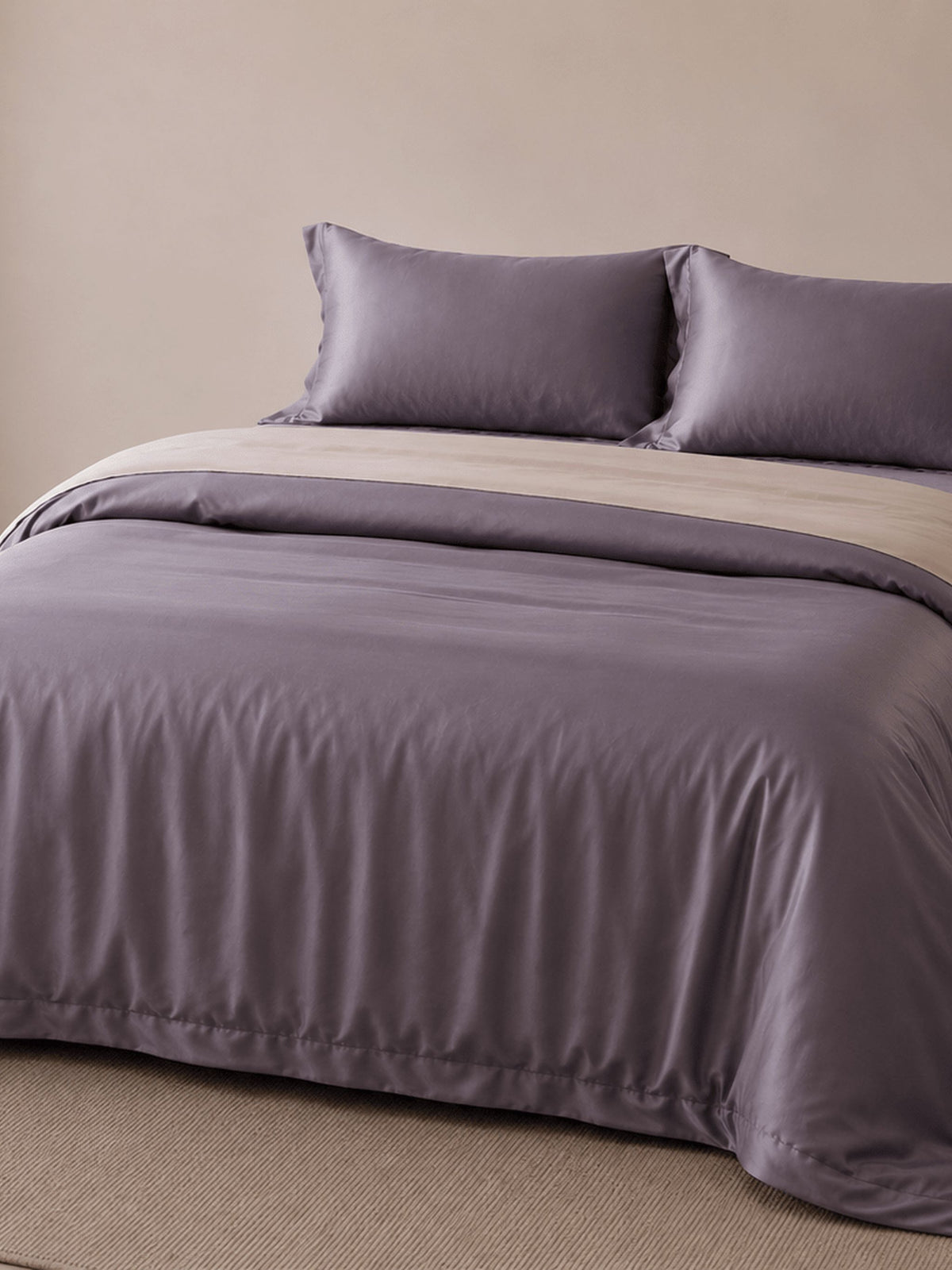 Charcoal mauve Tencel duvet cover with a cream reverse and two pillows