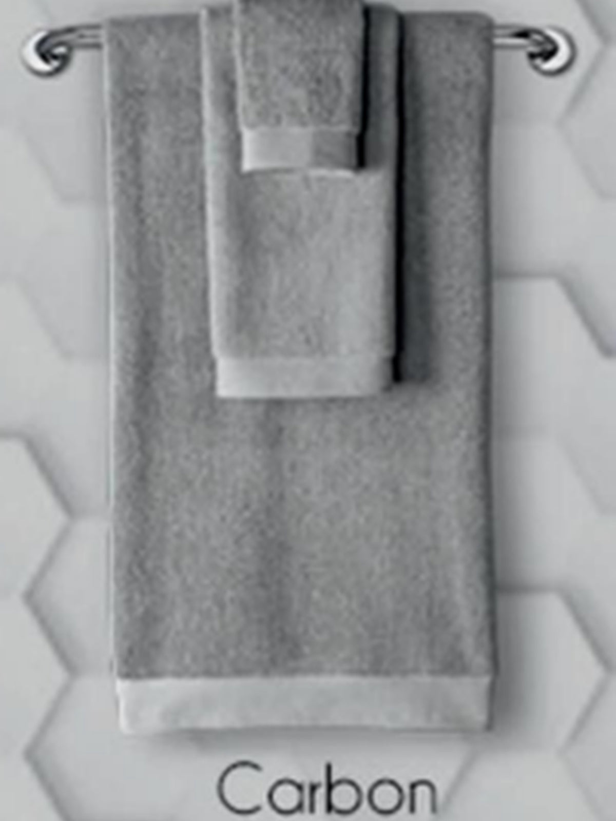 Mid grey cotton towel set hanging on a rail, Resort Towel in Carbon