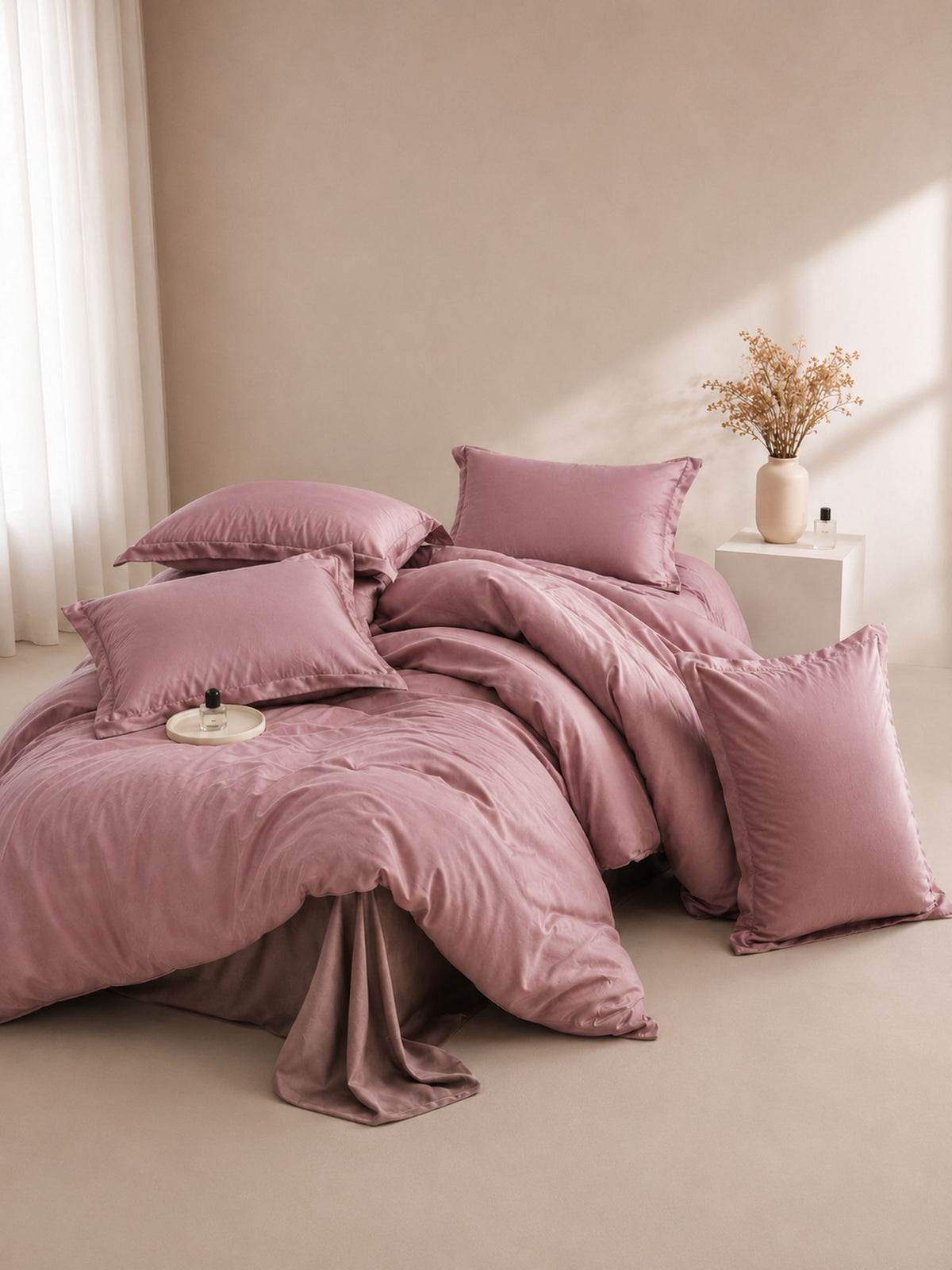 Mauve Tencel duvet cover and pillows in a sunlit bedroom