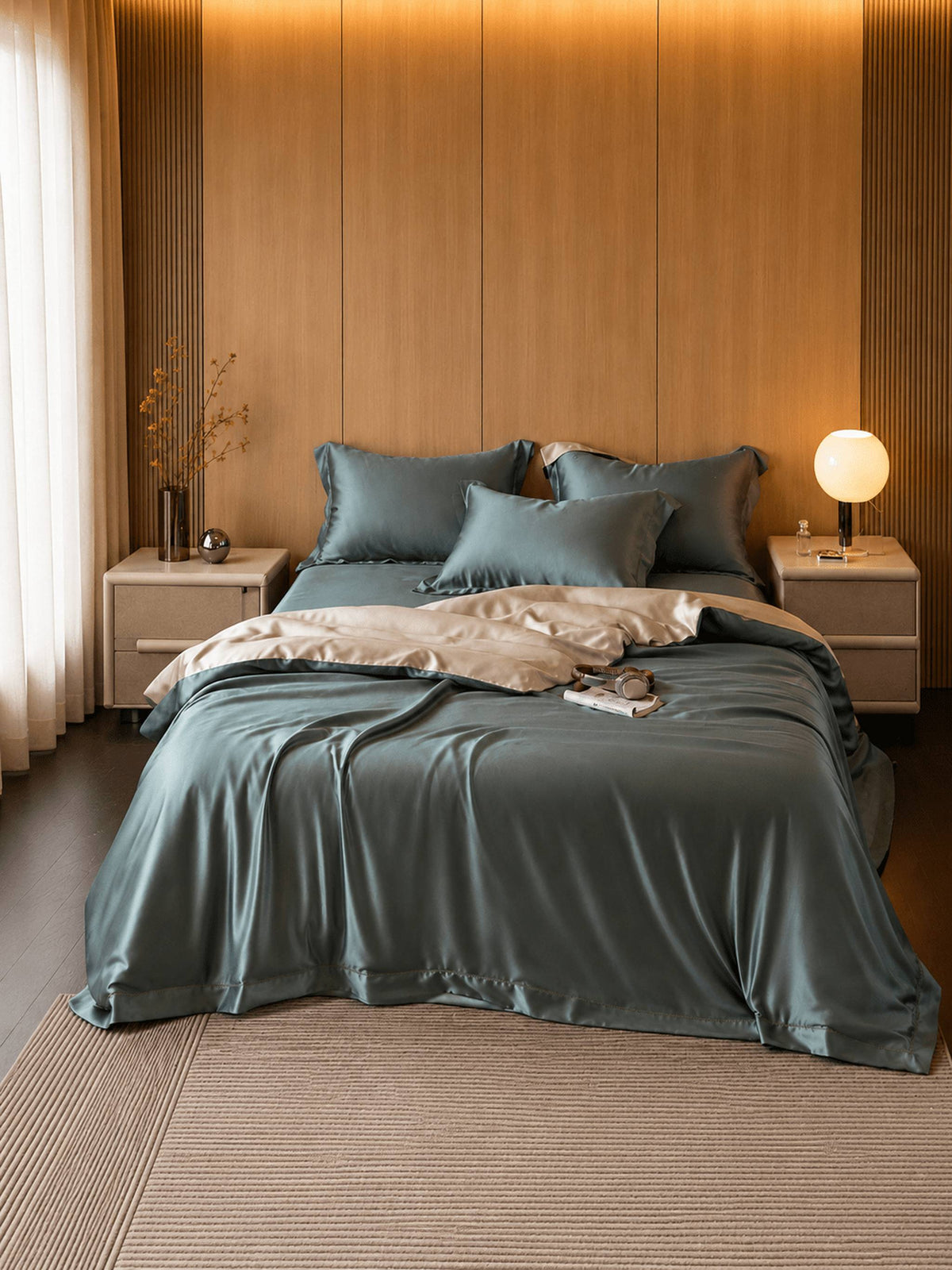 Slate teal Tencel bedding against a wood-panelled headboard, with a throw