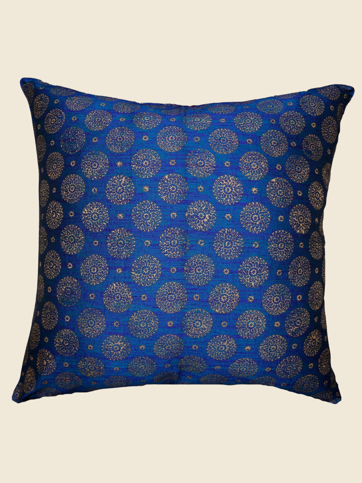 Royal blue cushion cover with an allover gold medallion brocade pattern