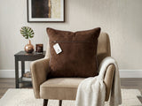 Brown geometric printed cushion cover featuring an abstract circular pattern in brown and beige tones