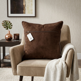 Brown geometric printed cushion cover featuring an abstract circular pattern in brown and beige tones