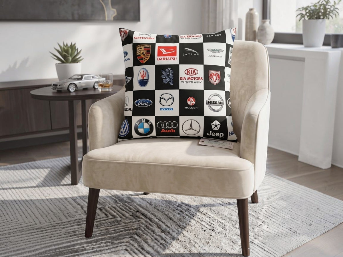Reversible black and white polysilk cushion cover featuring automotive logo checkerboard print