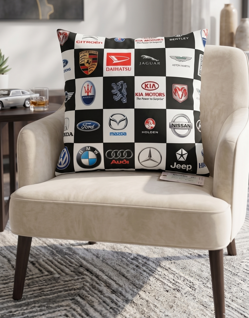 Reversible black and white polysilk cushion cover featuring automotive logo checkerboard print