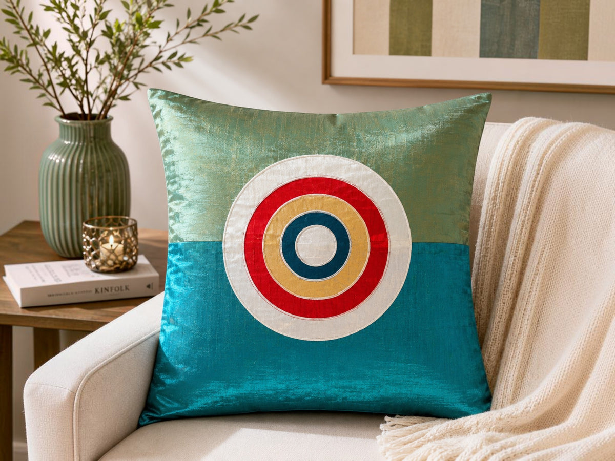 Blue patch work polysilk cushion cover with circular applique design