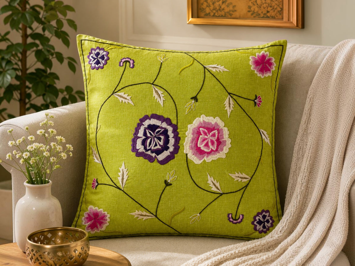 Green cotton cushion cover with floral embroidery and vine design