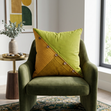 Green polysilk cushion cover with textured diagonal panel design and decorative button accents