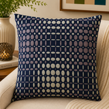Navy blue velvet cushion cover with geometric dot pattern in beige and taupe tones