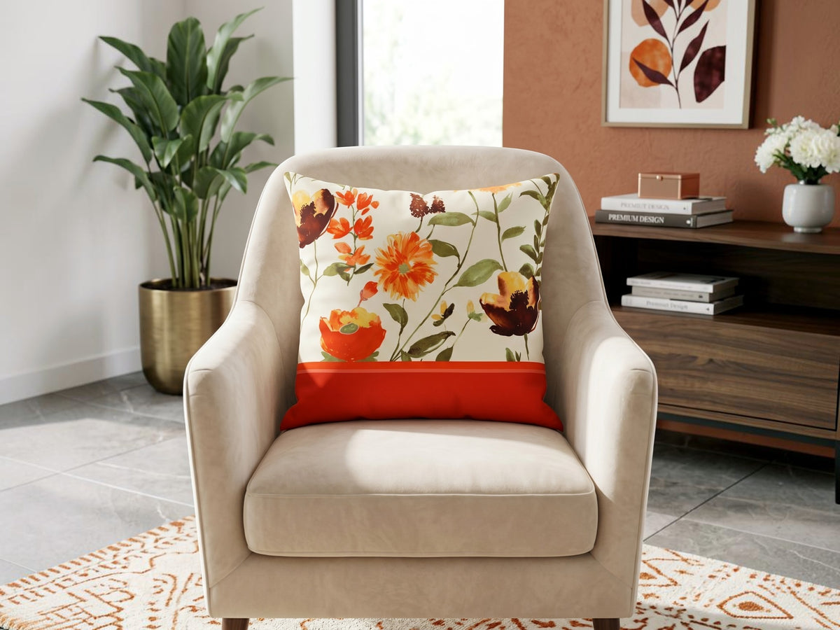 Orange floral printed polysilk cushion cover featuring watercolor flower motifs on an ivory background with orange border detailing