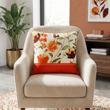Orange floral printed polysilk cushion cover featuring watercolor flower motifs on an ivory background with orange border detailing