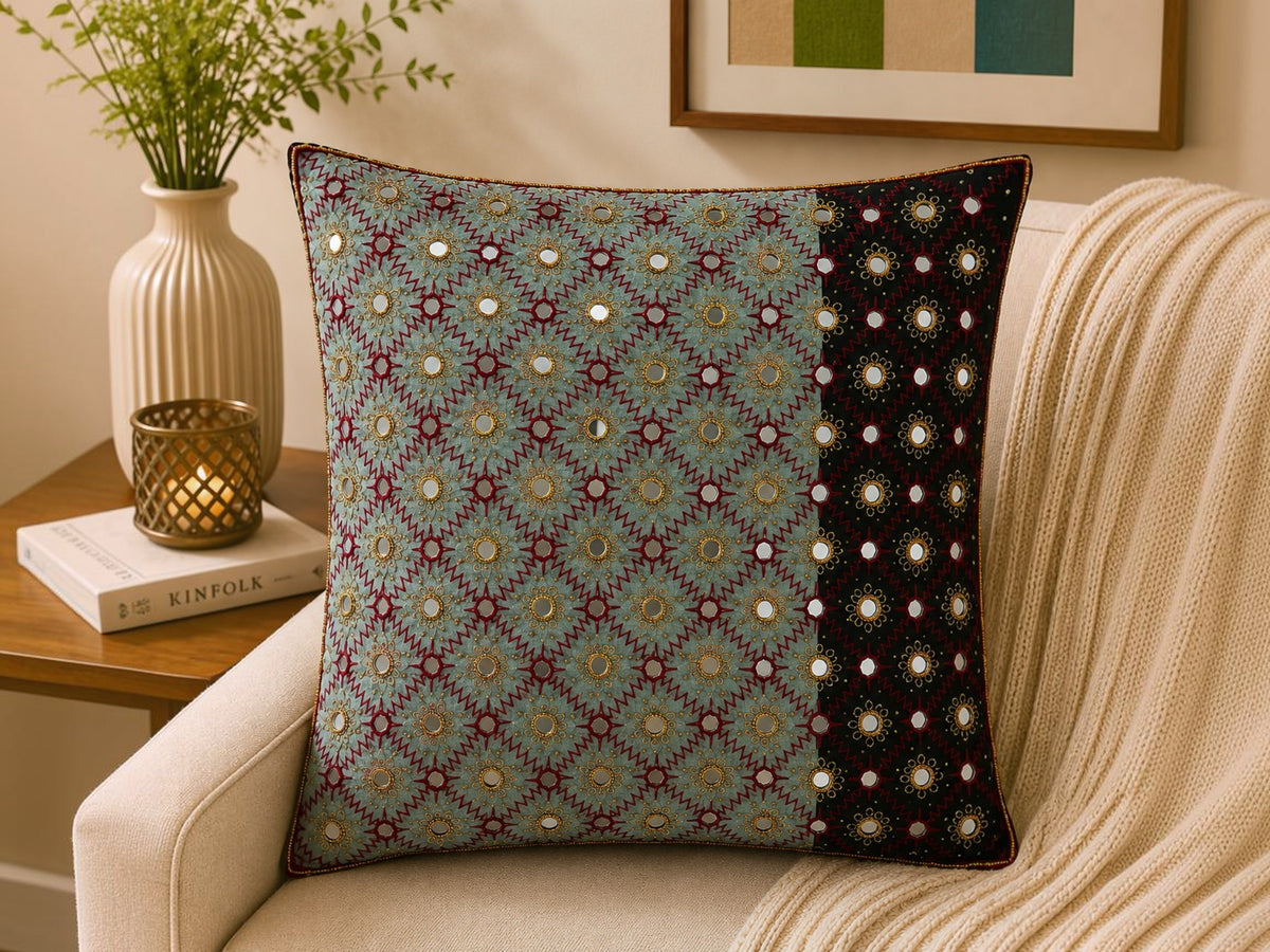 Sage green polysilk cushion cover featuring embroidered motifs with decorative bead work accents