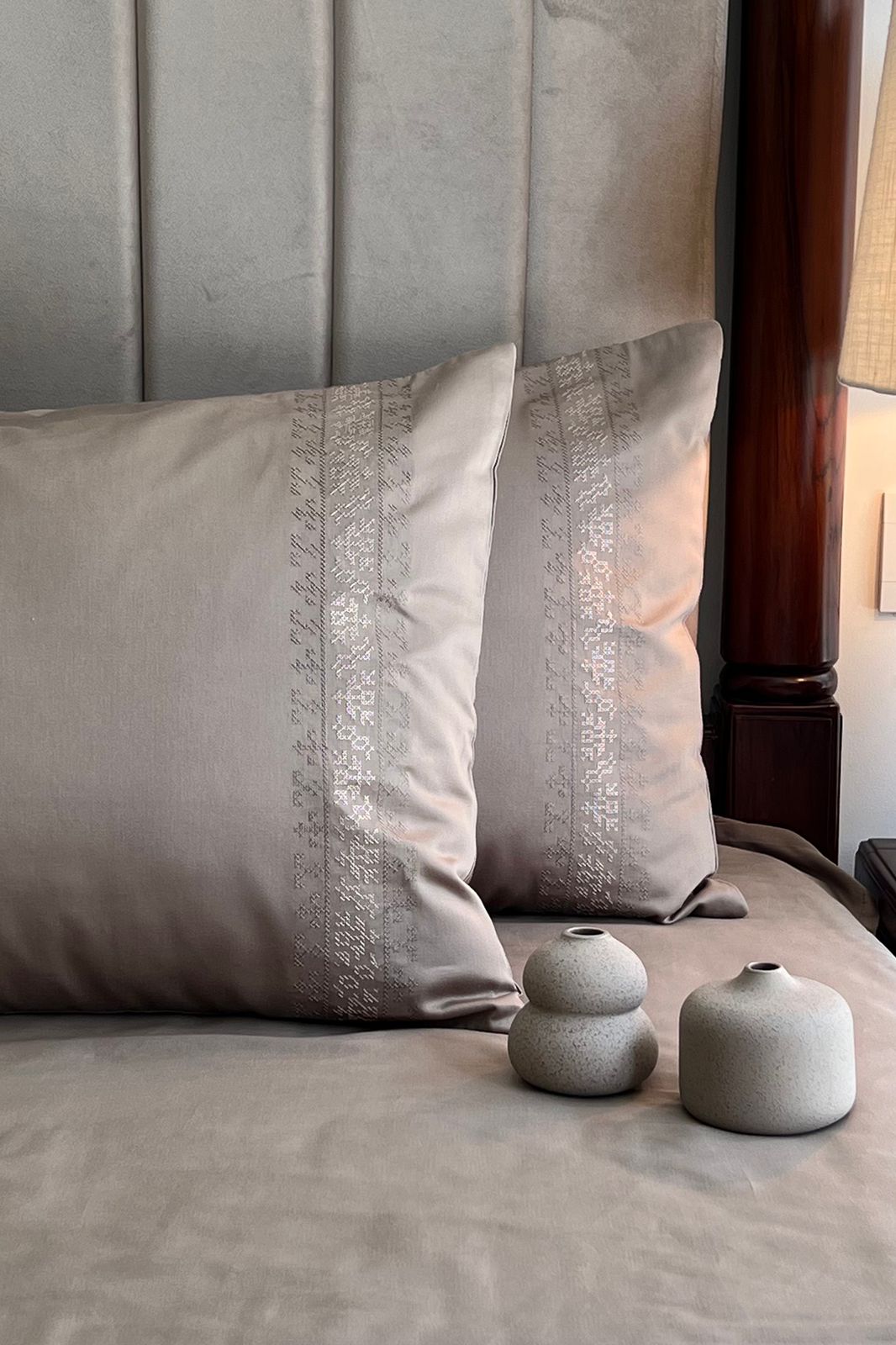 Greige bedding with a fine tonal embroidered band on the pillows, Greige Delight