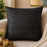 Jagdish Store black decorative throw cushion cover with pleated vertical channels revealing vibrant red accents.