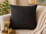 Jagdish Store black decorative throw cushion cover with pleated vertical channels revealing vibrant red accents.