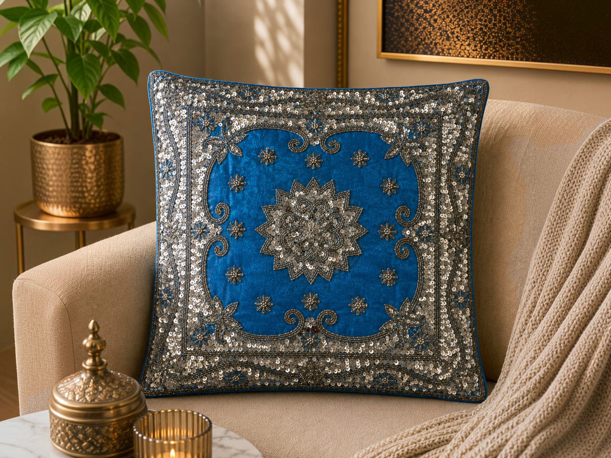 Jagdish Store blue cushion cover with intricate silver sequin and bead floral embroidery and border. Approx 16x16 inches.