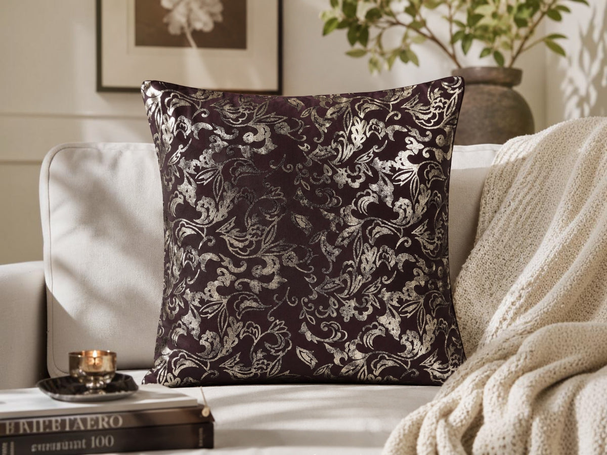 Dark aubergine velvet cushion cover with a silver foil floral print