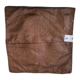 Jagdish Store brown decorative throw pillow cover with subtle embossed spiral triskele pattern and silk-like texture.