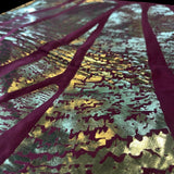 Jagdish Store burgundy cushion cover with abstract gold foil pattern for a luxurious modern home decor accent.