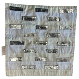 Jagdish Store cream throw pillow cover with staggered metallic silver leather rectangular accents for modern decor.