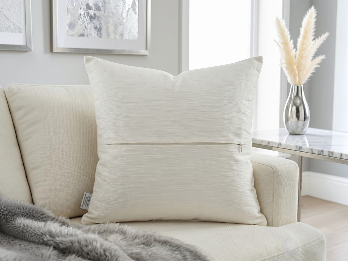Jagdish Store cream throw pillow cover with staggered metallic silver faux leather rectangular accents for modern home decor.