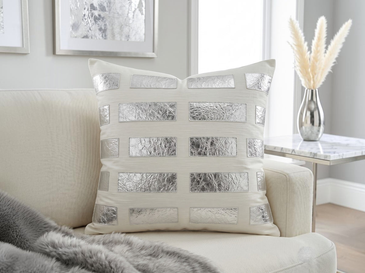 Jagdish Store cream throw pillow cover with staggered metallic silver faux leather rectangular accents for modern home decor.