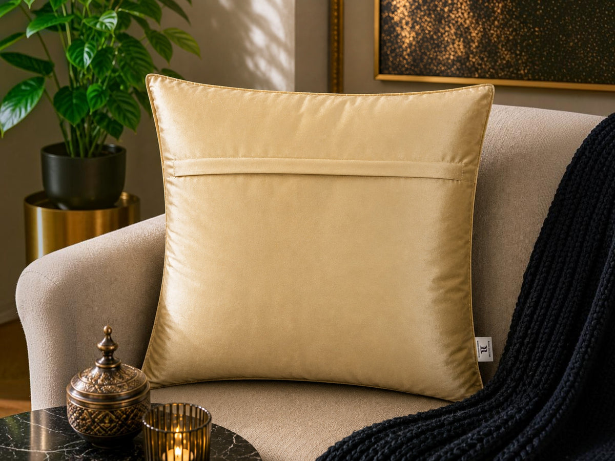 Jagdish Store beige embellished accent cushion cover with radiating pleats and gold accents.