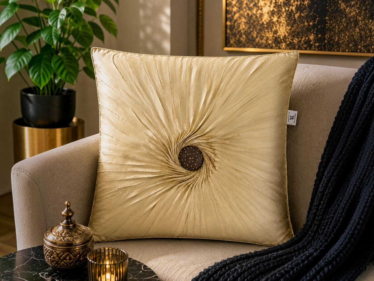 Jagdish Store beige embellished accent cushion cover with radiating pleats and gold accents.