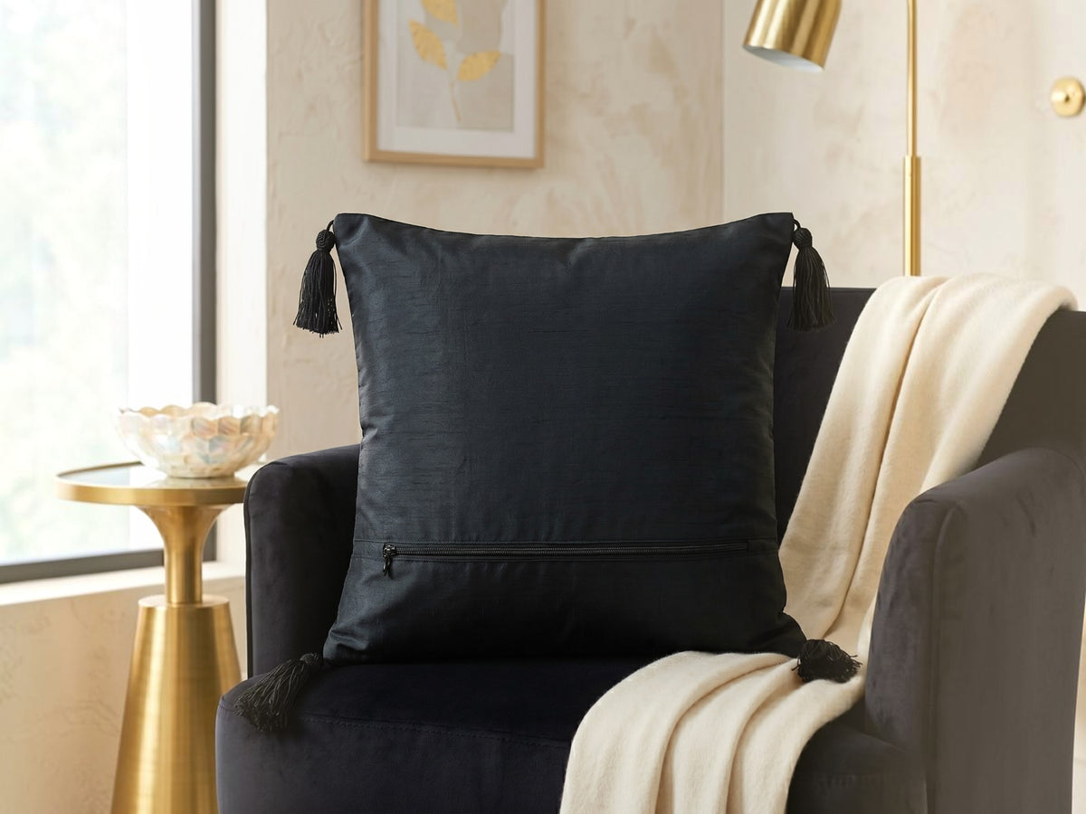 Jagdish Store midnight blue cushion cover with gold sequins, glass beads, white buttons, and black corner tassels.