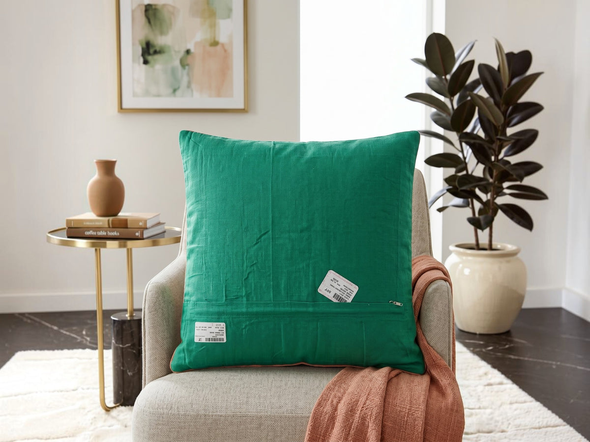Jagdish Store pink quilted cushion cover with embroidered silver thread, colorful beads, and emerald green border.