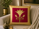 Jagdish Store decorative cushion cover with crimson red fabric, gold lotus embroidery, and gold trim. Features green accents.