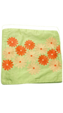Jagdish Store lime green throw pillow cover with embroidered orange and peach floral pattern. Textured fabric.