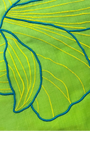 Jagdish Store lime green pillow cover with embroidered yellow floral design and teal outlines. Textured fabric.