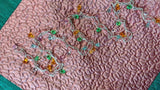 Jagdish Store pink quilted pillow cover with embroidered silver thread, colorful beads, and emerald green border.