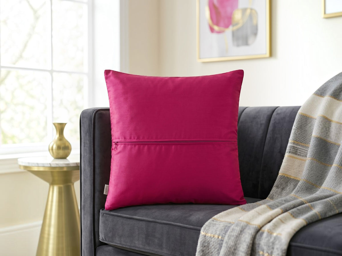 Jagdish Store fuchsia decorative square throw cushion cover with a radiating pleated design and central rosette.