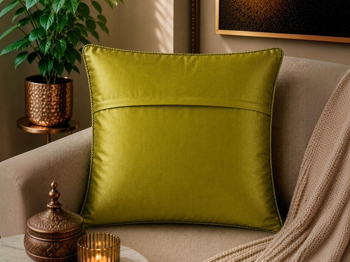 Jagdish Store decorative cushion cover in lime green satin with white floral lace trim. Elegant floral accents.
