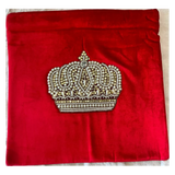 Jagdish Store red velvet cushion cover featuring a hand-embellished crown with faux pearls and gold-tone accents.