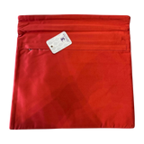 Jagdish Store red velvet cushion cover with hidden zipper closure, shown on a soft white faux fur background.
