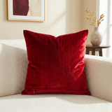 Jagdish Store red velvet cushion cover with an intricate gold glitter filigree motif for festive home decor.