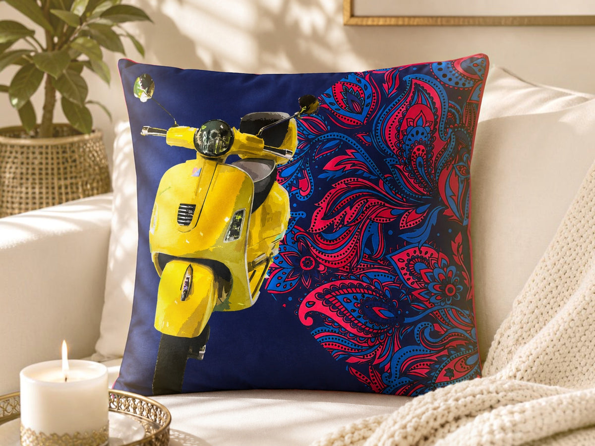Jagdish Store reversible throw cushion cover with yellow scooter and pink and blue paisley print on navy fabric.