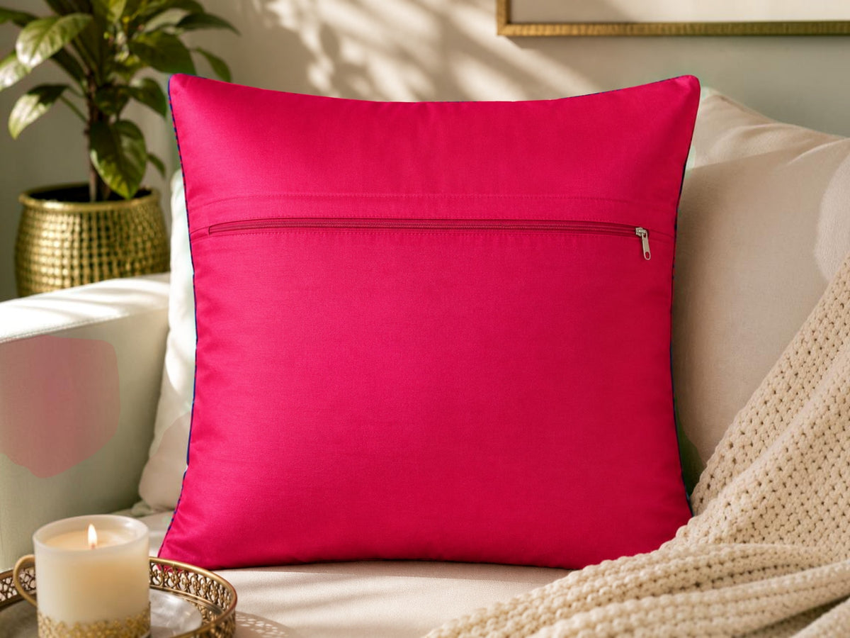 Jagdish Store reversible throw cushion cover with yellow scooter and pink and blue paisley print on navy fabric.