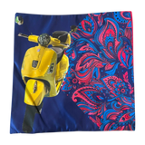 Jagdish Store decorative throw pillow cover with a yellow scooter and blue and pink paisley print on navy fabric.