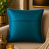 Jagdish Store teal decorative cushion cover with gold sequins and clear bead embellishments in a geometric pattern.